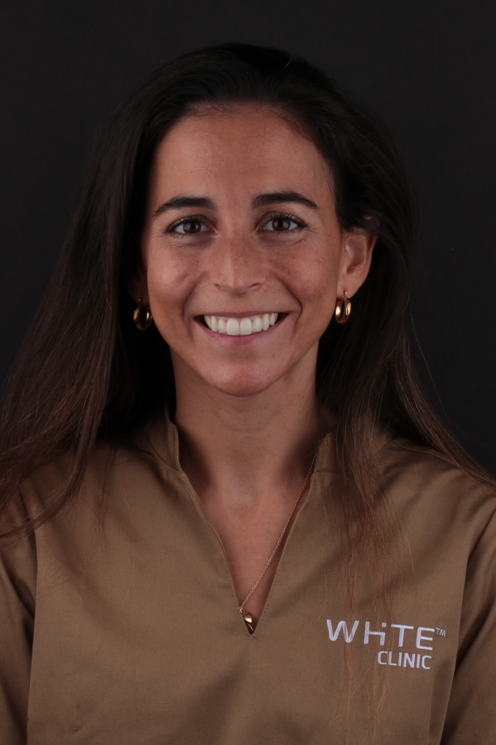 Dra. Maria Verissimo - Médica Dentista